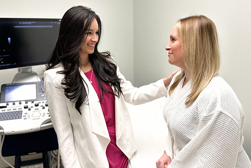 Dr. Wilder smiling at a patient.