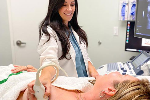 Dr. Wilder performing an ultrasound on a patient.